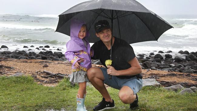 Burleigh Heads residents Andreas Vatne and his daughter Sienna, 3, getting out of the house for some fresh air at Burleigh on Tuesday. Picture: Glenn Hampson