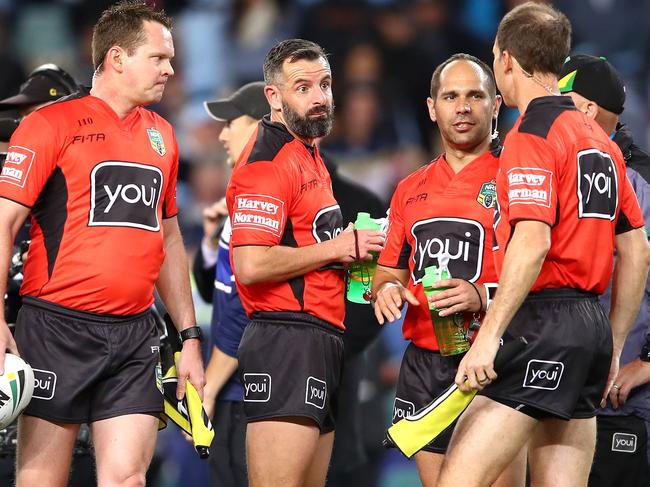 SYDNEY, AUSTRALIA - SEPTEMBER 10:  Referees Gavin Badger and Ashley Klein speak to the touch judges between the end of regulation time and extra time during the NRL Elimination Final match between the Cronulla Sharks and the North Queensland Cowboys at Allianz Stadium on September 10, 2017 in Sydney, Australia.  (Photo by Mark Kolbe/Getty Images)