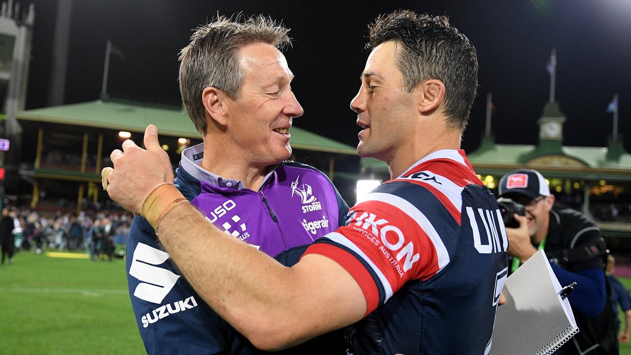 Storm coach Craig Bellamy and Cooper Cronk.