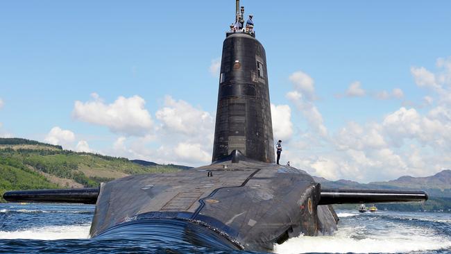 Royal Navy submarine HMS Victorious departs HMNB Clyde.