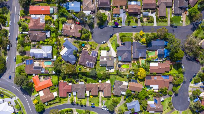 Aerial view of Suburban roof tops directly above