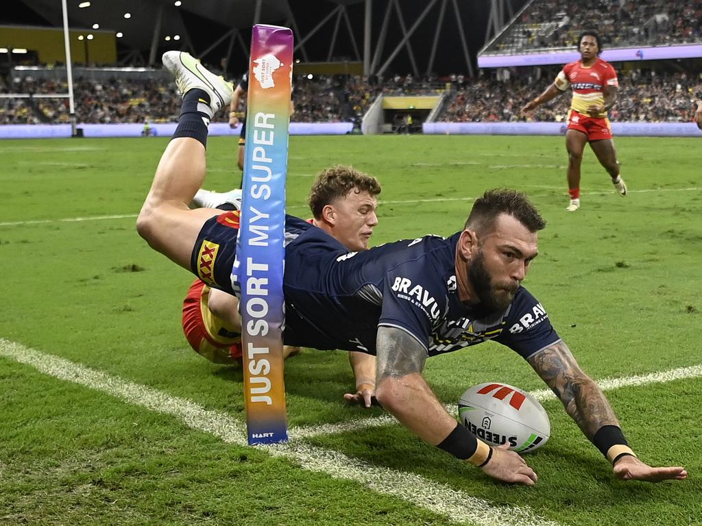 Kyle Feldt scores in the corner. Picture: Ian Hitchcock/Getty Images