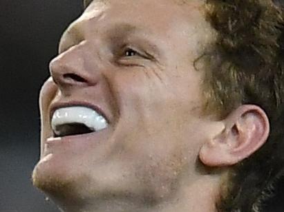 Will Hoskin-Elliot of the Magpies reacts after kicking a goal during the Round 11 AFL match between the Collingwood Magpies and the Fremantle Dockers at the MCG in Melbourne, Sunday, June 3, 2018. (AAP Image/Julian Smith) NO ARCHIVING, EDITORIAL USE ONLY