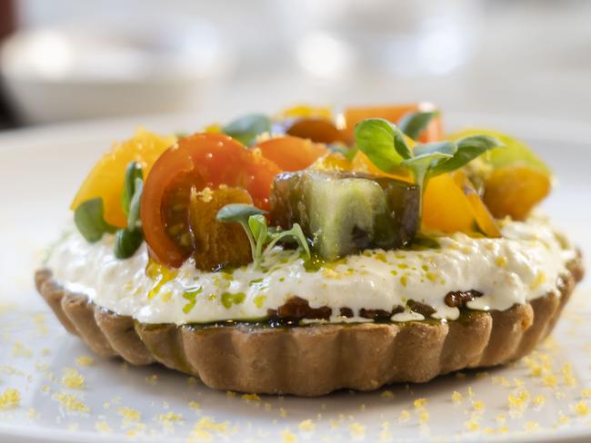 Franca restaurant at Potts Point is in the top 100 Delicious restaurants of Sydney. Tomato Tart with stracciatella and basil. Picture: Matthew Vasilescu