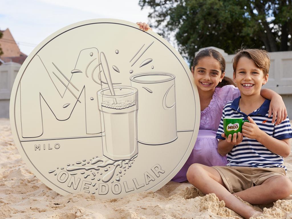 KIDS NEWS: Australia Post's Great Aussie Coin Hunt. Lucy and Archie, both 7, pictured with a giant M for MILO. Picture: Australia Post/David Swift.