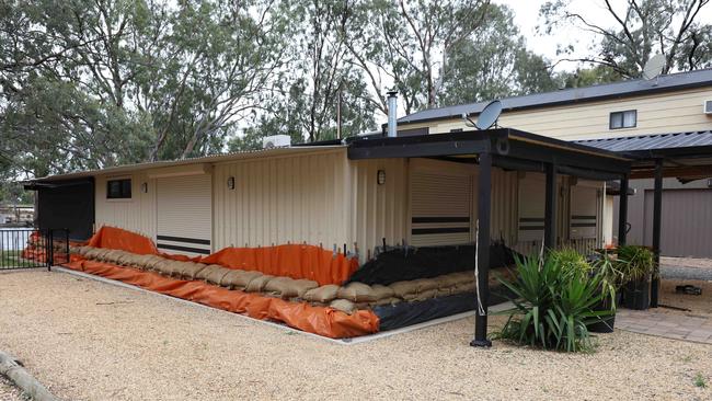 Paisley Island residents prepare homes for the rising river water on Paisley Island, SA. Picture Emma Brasier