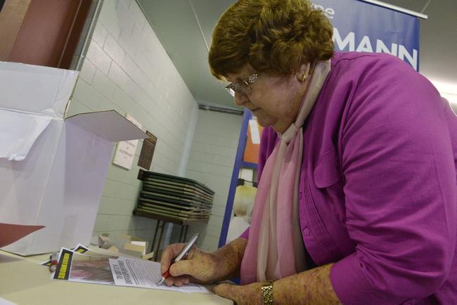 BRING IT BACK: Peggy Frankish signs the petition. Picture: Inga Williams