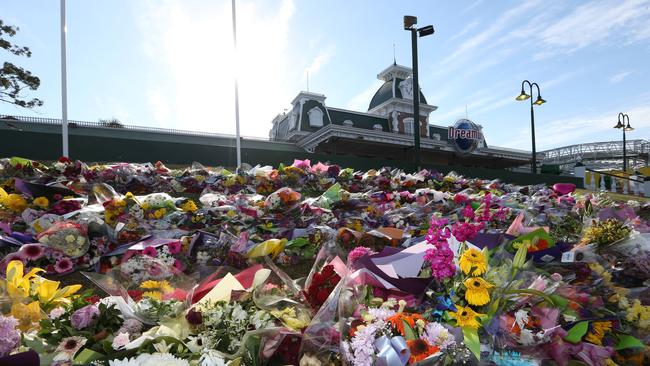 The memorial outside Dreamworld days after the tragic incident. Picture: Glenn Hampson