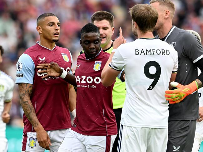 BRISBANE, AUSTRALIA - JULY 17: Diego Carlos of Aston Villa and Patrick Bamford of Leeds United are involved in an altercation during the 2022 Queensland Champions Cup match between Aston Villa and Leeds United at Suncorp Stadium on July 17, 2022 in Brisbane, Australia. (Photo by Bradley Kanaris/Getty Images)