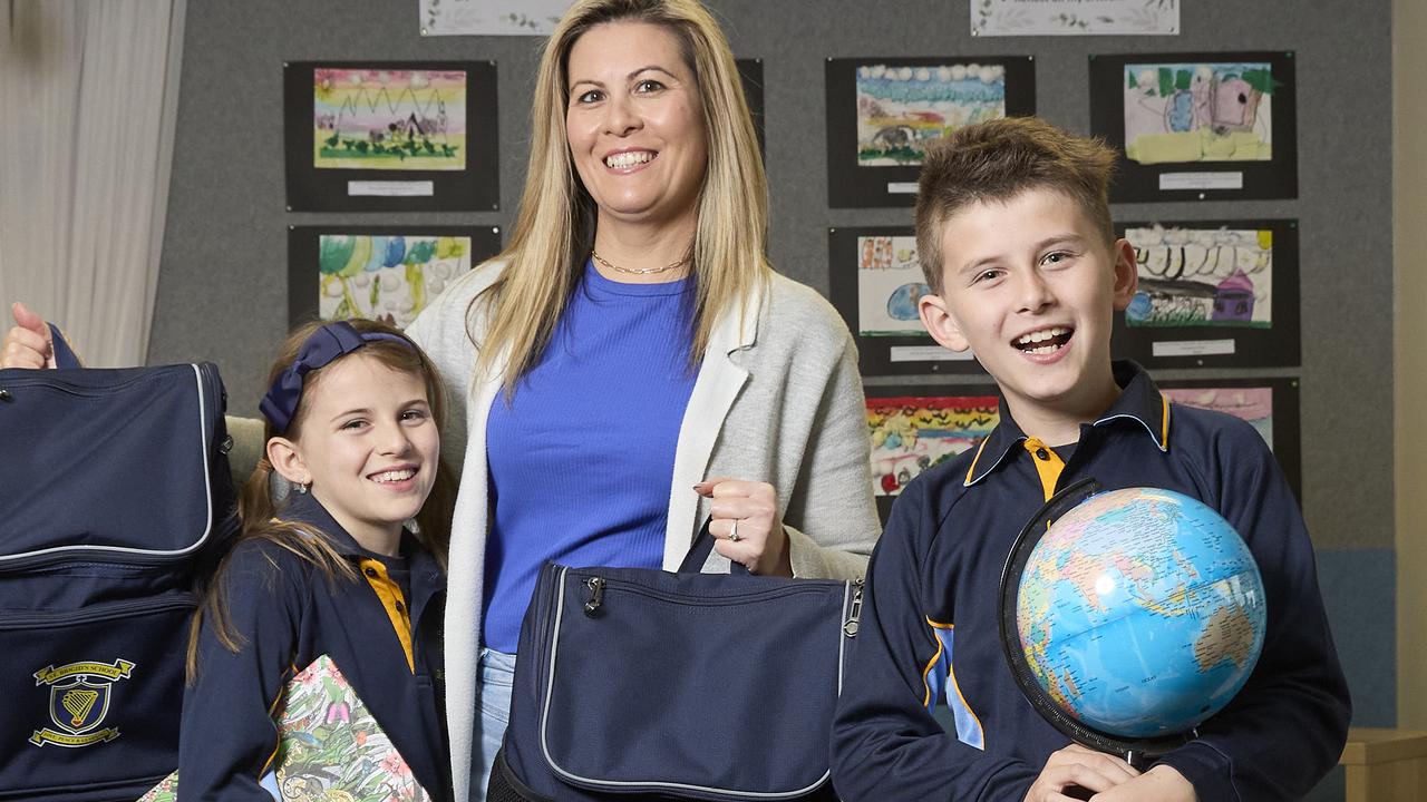 Tiana with mum, Mara Omar, and brother, Mateo at St Brigid's School in Kilburn. Picture: Matt Loxton