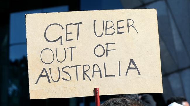 Angry Taxi Drivers Threaten Strike Over Uber Ridesharing Service ...