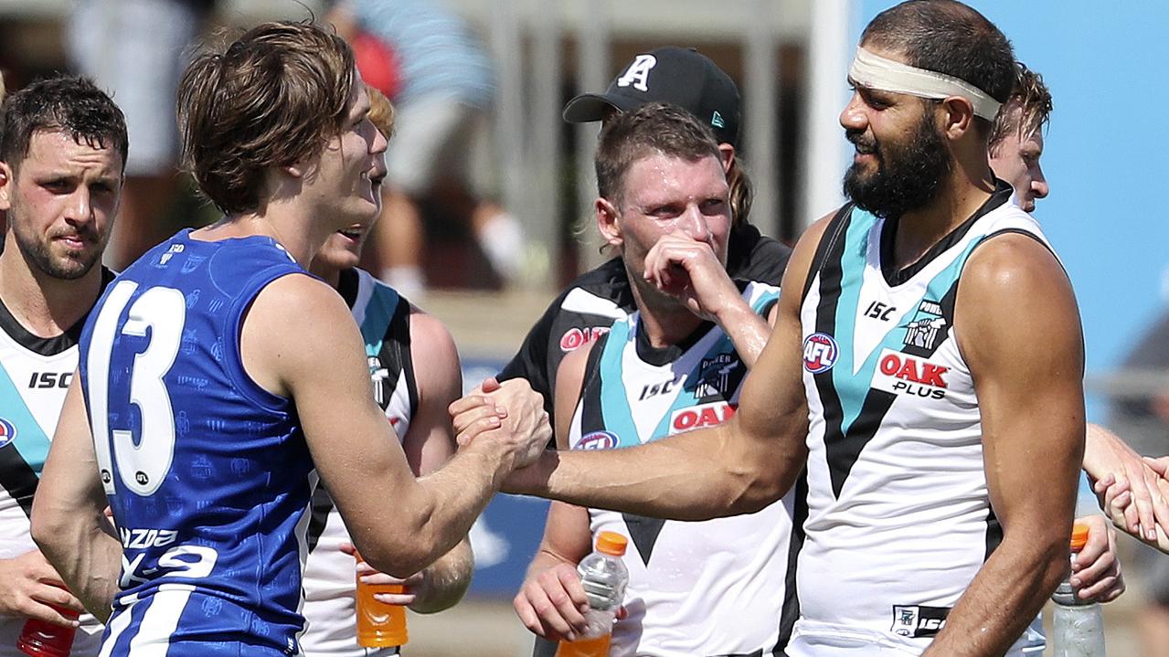 North Melbourne’s Jared Polec with former Port Adelaide teammate Paddy Ryder after a pre-season game. Picture: Sarah Reed