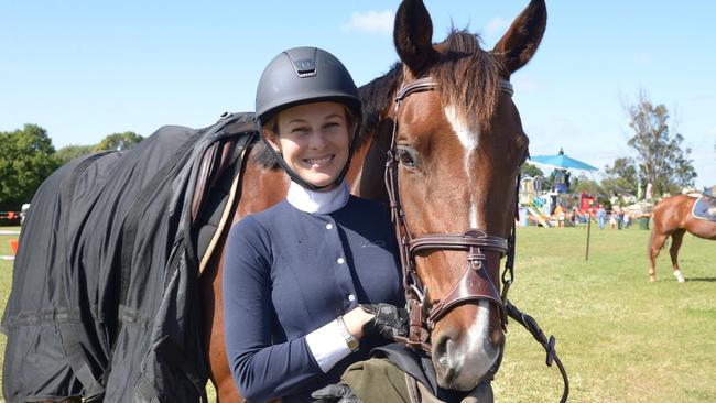 HORSING AROUND: Cassie Honor and Vovo are ready for the jumps at the Childers show. Photo: Paul Donaldson / NewsMail