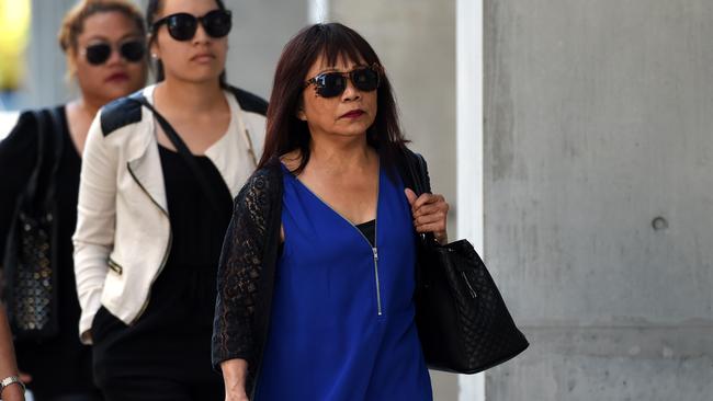 Merzabeth Tagpuno (right), the mother of New Zealand woman Warriena Wright, arrives at the Supreme Court in Brisbane,