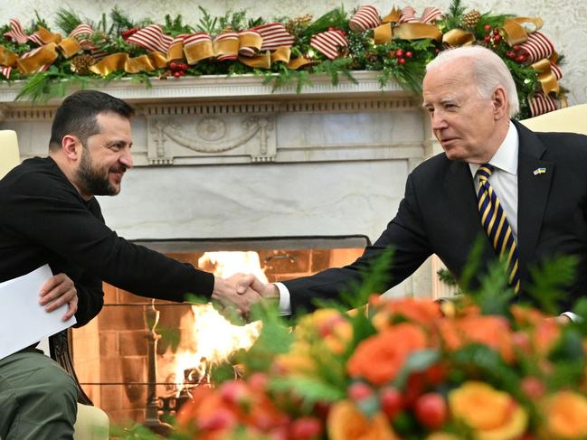 US President Joe Biden shakes hands with Ukrainian President Volodymyr Zelenskyy in the Oval Office. Picture: AFP