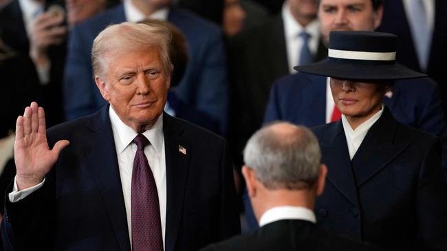 Donald Trump is sworn in as the 47th president of the United States by Chief Justice John Roberts as Melania Trump holds the Bible in the US Capitol Rotunda in Washington, DC. Picture: AFP