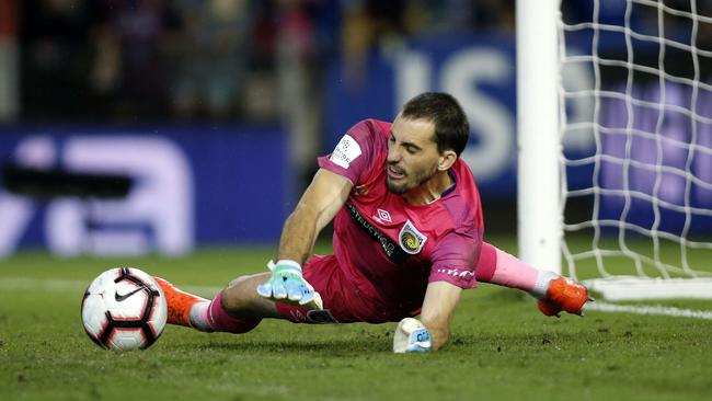 Mariners keeper Ben Kennedy saves his second penalty. Picture: AAP