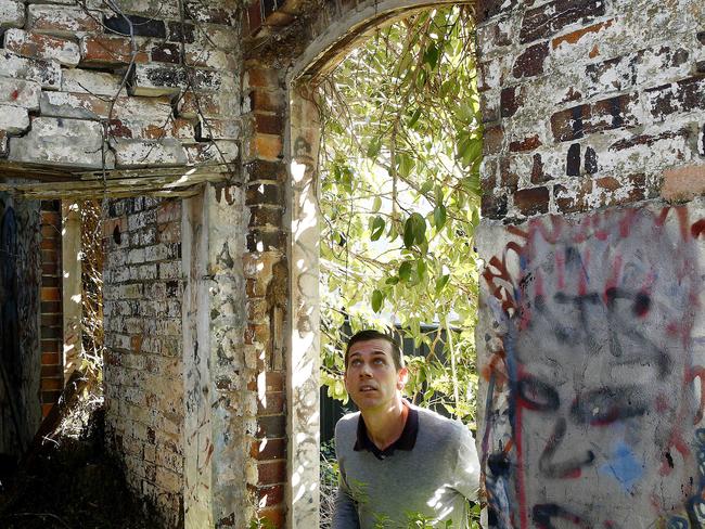 Real Estate Agent Damien West looks  Inside The property up for sale at 52 Juliett street Enmore that  has been left to rot for years and has no roof. It qualifies as one of the worst Inner west dumps to ever hit the market. Picture: John Appleyard