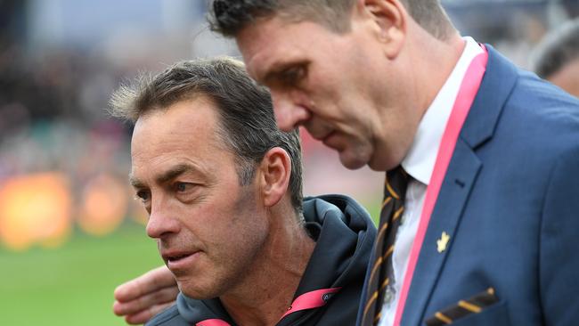 Alastair Clarkson and Justin Reeves. Picture: AAP