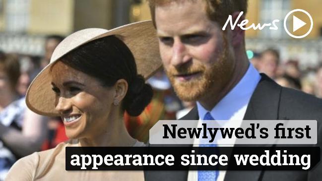 Prince Harry and Meghan Markle make their first appearance as a married couple