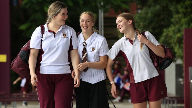 Ella Ramsay last year at school, St Peters Lutheran College, after winning Dolphins’ selection for the first time. She was with school friends Victoria Kuhn 17, and Ella Kreutzer 16. Pics Adam Head