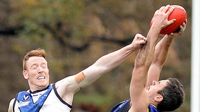 VAFA football: University Blacks V University Blues. No 16 Pappy Hayes for Blues. No 39 Adam Pitt for Blacks. Picture: David Smith