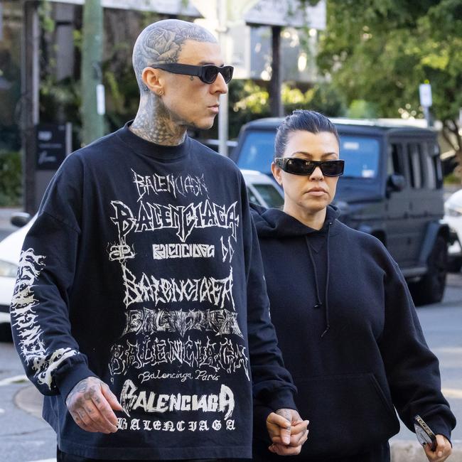 Travis Barker and Kourtney Kardashian out walking in Brisbane.