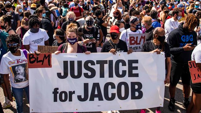 Protesters march with the family of Jacob Blake, who was shot by police on August 23. Picture: Stephen Maturen/AFP