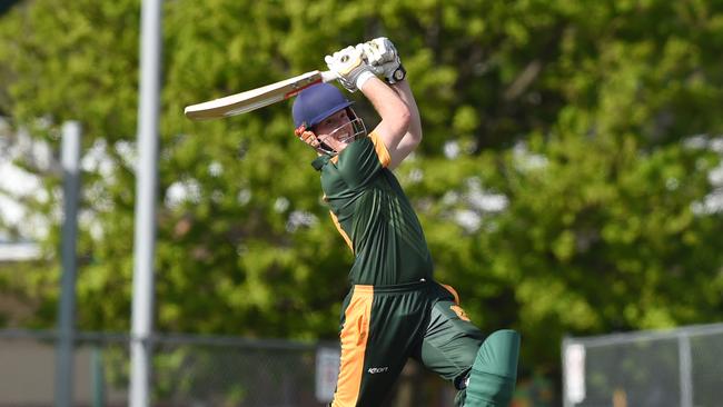 Tim Clarke clubs a four on his way to a season-opening hundred for Mt Eliza. Picture: AAP/ Chris Eastman