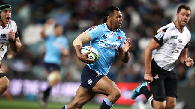 Waratahs star Kurtley Beale on his way to the tryline.