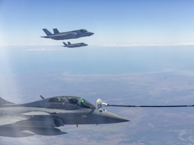 A French Rafale jet refuels mid-air about 100km south of Darwin. Picture: Floss Adams.