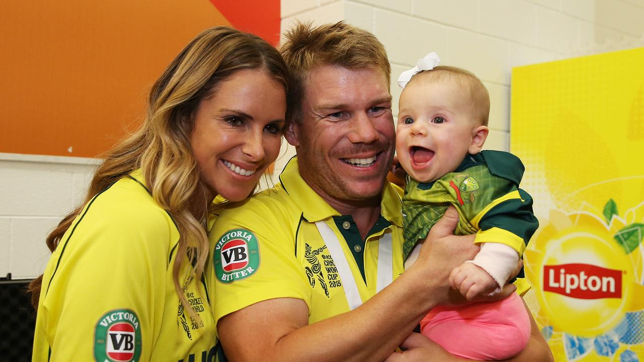 Candice, David and daughter Ivy in the dressing rooms after Australia’s 2015 World Cup final win. picture. Phil Hillyard