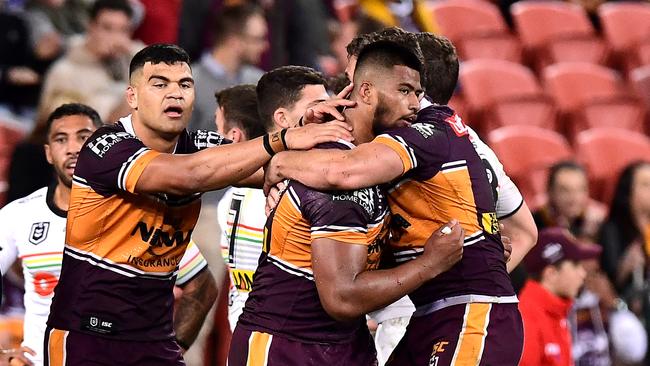 Payne Haas is congratulated by teammates after scoring a try. Picture: Bradley Kanaris/Getty Images