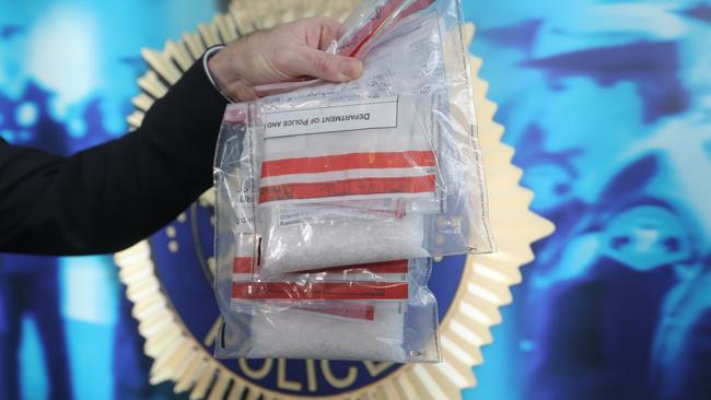 Detective Inspector Jason Elmer with 10 ounces of ice that was seized by Tasmania Police. Picture: LUKE BOWDEN