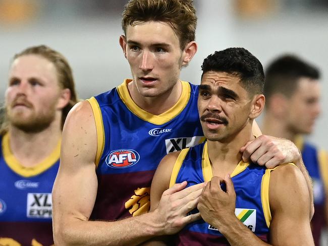 BRISBANE, AUSTRALIA - OCTOBER 17: Harris Andrews and Charlie Cameron of the Lions are dejected after the Cats defeated the Lions during the AFL 2nd Preliminary Final match between the Brisbane Lions and the Geelong Cats at The Gabba on October 17, 2020 in Brisbane, Australia. (Photo by Quinn Rooney/Getty Images)