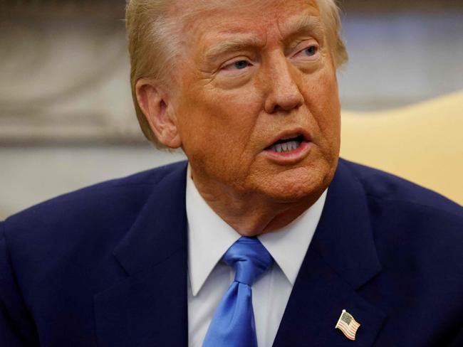 US President Donald Trump meets with French President Emmanuel Macron (out of frame) in the Oval Office of the White House in Washington, DC, on February 24, 2025. (Photo by Ludovic MARIN / POOL / AFP)