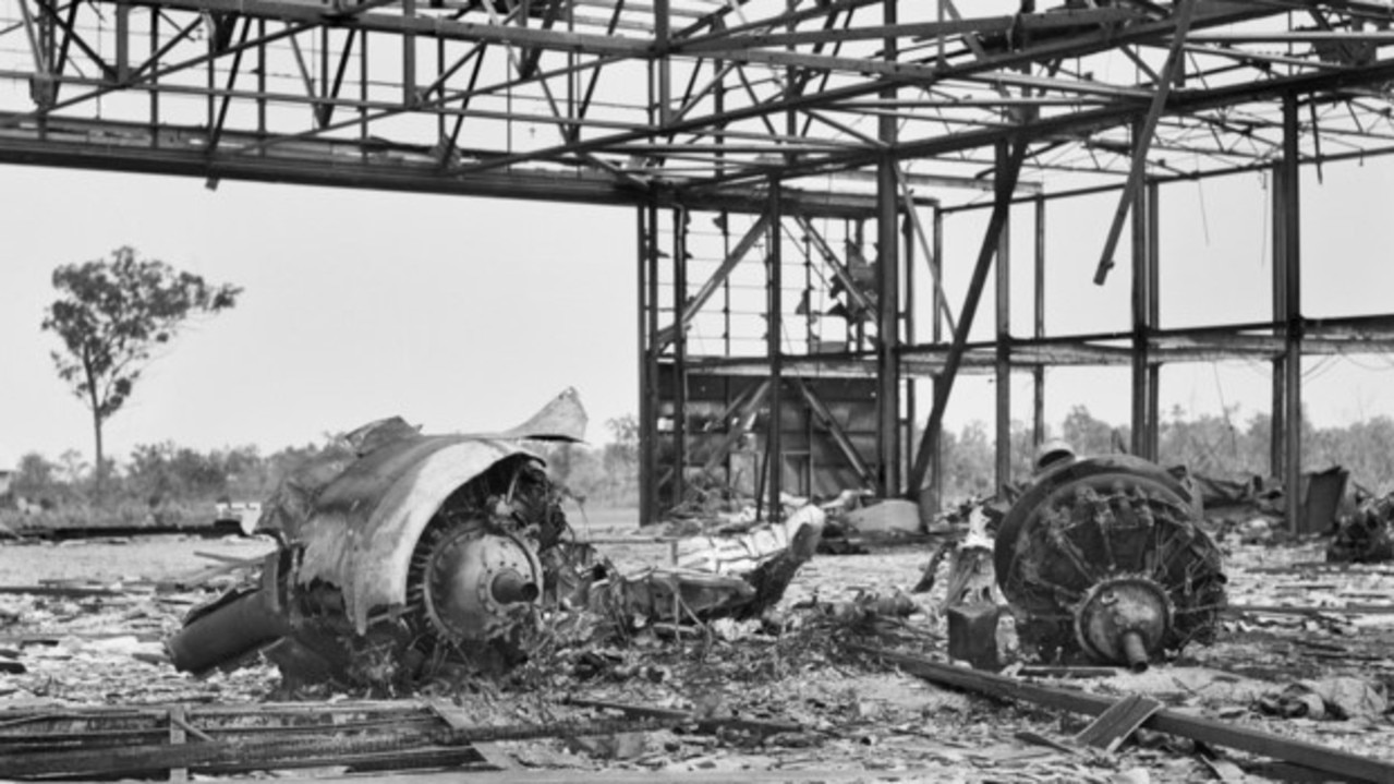 Engine parts of two Willaway aircraft in a hangar after the Japanese bombing of Darwin Airfield in February 1942. Photo: Australian War Memorial.