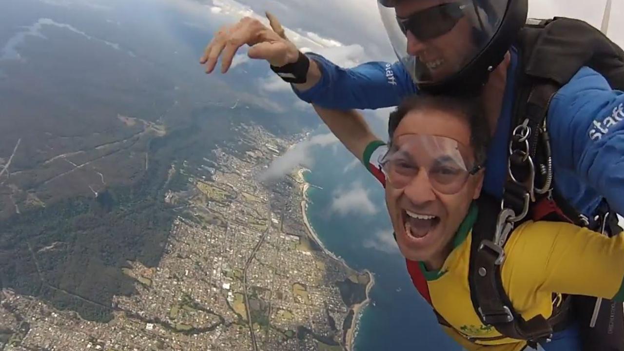 Dr George Hatoum took part in a charity parachute jump and has his own website promoting his charity deeds. Picture: YouTube