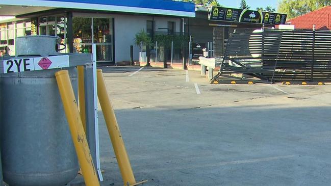 The man reportedly hit a fence and bollards at a service station on Marion Rd before fleeing and threatening a driver with a knife. Picture: 7NEWS