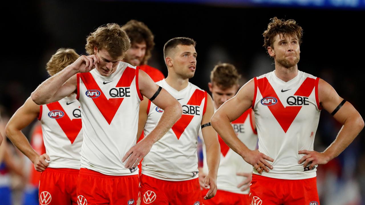 Nick Blakey and Dane Rampe of the Swans look dejected after a loss