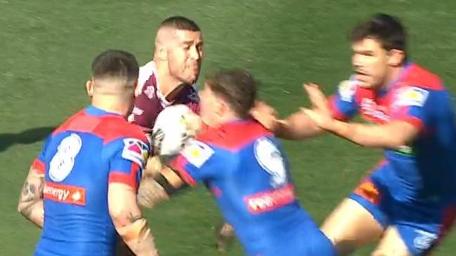 The injury happened after Thompson stuck his tongue out before clashing heads with a Knights hooker Kurt Mann. Picture: Fox League.