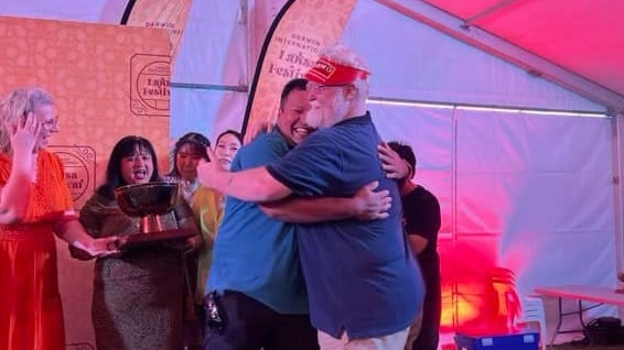 Golden Bowl 2024 winning restaurateurs Romal Mr Shrestha (left) embraces Chow owner Jason Hanna after being announce joint winners of the 2024 Golden Bowl at the Darwin International Laksa Festival. Picture: Facebook