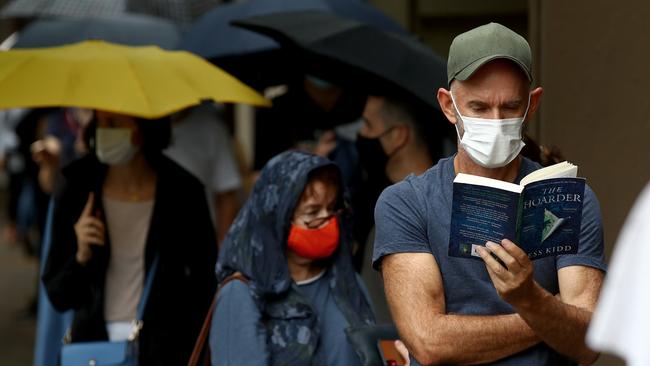 Sydneysiders turn out in droves to get Covid-19 tests with queues at the St Vincent's clinic on Burton St in Darlinghurst stretching around several streets. Picture: Toby Zerna