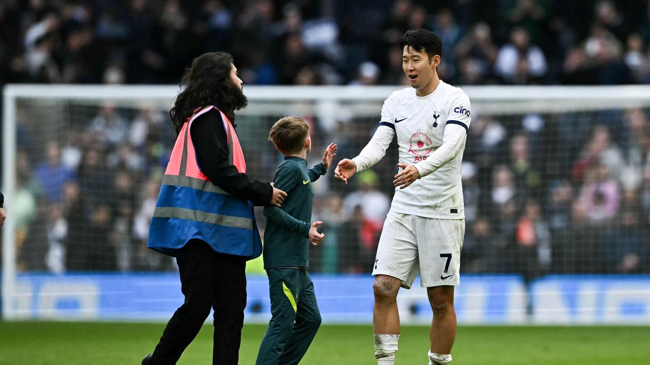 Son even had time to make friends with a young pitch invader.