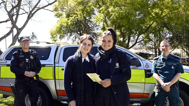 STAY SAFE: Discussing road safety at St Ursula's College yesterday were (from left) Toowoomba Road Policing Unit Senior Constable Philip Dunster, students Georgie Durie and Molly Hartog, and QAS officer-in-charge Jamie Taylor.