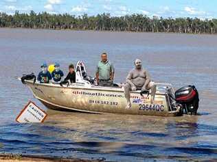 MUDMAN AND HIS CREW: A re-enacted photo from that fateful day. Picture: Angus Gale