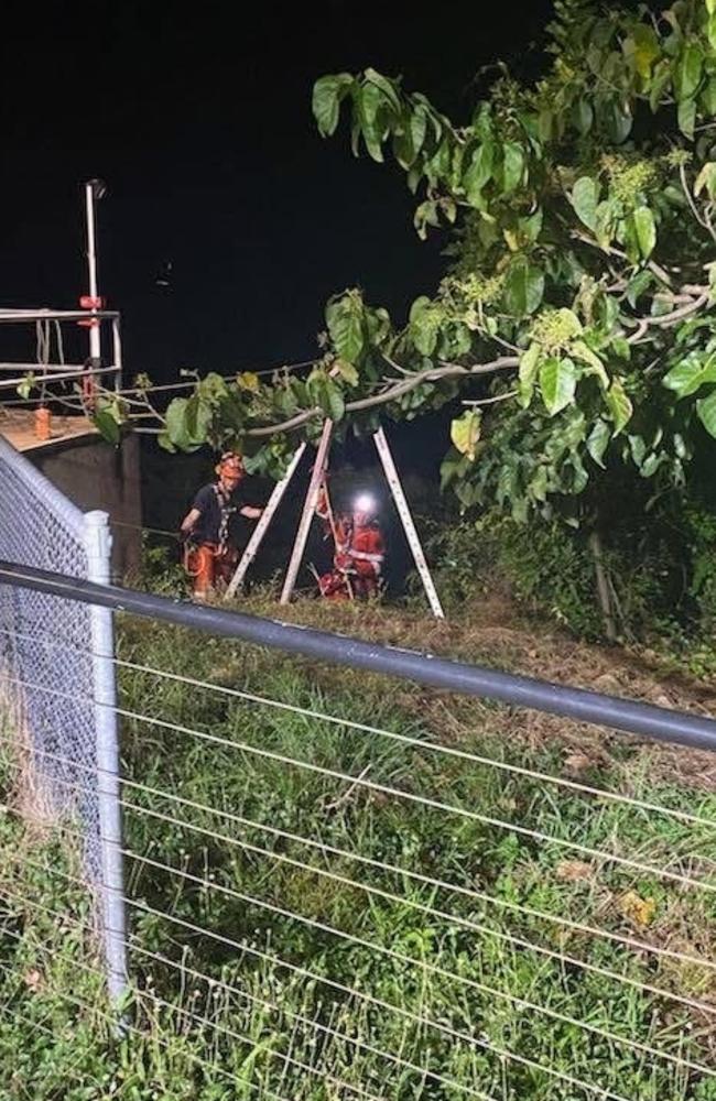 Rescue workers helping a man who plunged from Darwin cliffs in the CBD