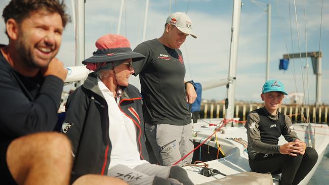 Young sailor Max Jameson with his crewmates at the world Etchells championships. Picture: Nic Douglass