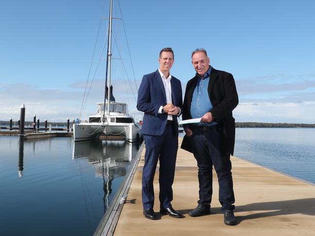 Metricon Queensland general manager Luke Fryer, with developer Keith Johnson (right), says they are committed to fixed-price contracts and they absorb the price rises. Picture: Sue Graham