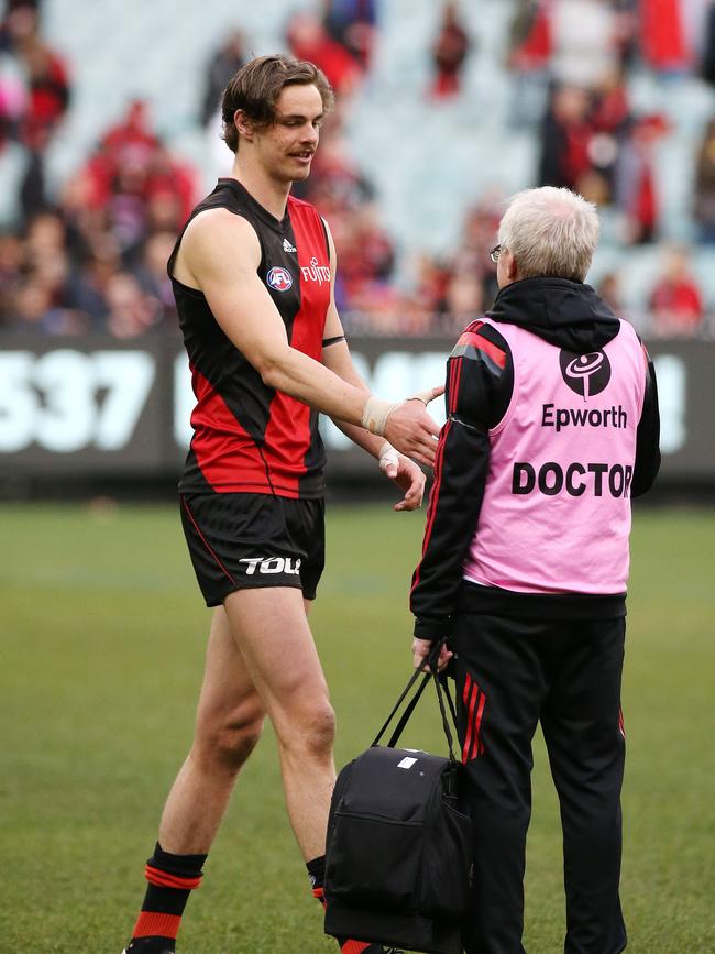 Bruce Reid chats with Joe Daniher.